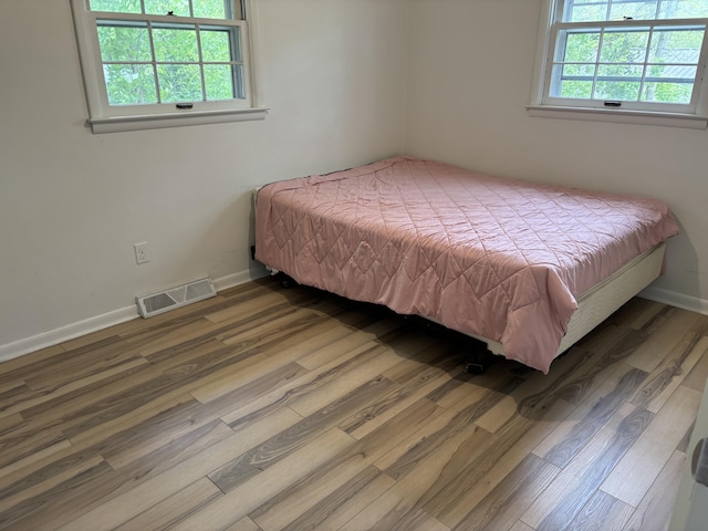 814 N Lakeview Ave, Sturgis, MI 49091 - bedroom with wood finished floors and baseboards