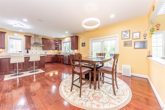 15390 Prestwick Cir, Northville, MI 48168 - dining space featuring dark wood finished floors, recessed lighting, and baseboards