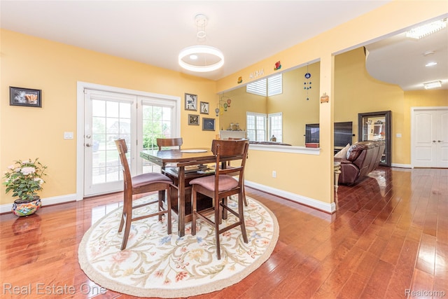 15390 Prestwick Cir, Northville, MI 48168 - dining space with wood finished floors and baseboards