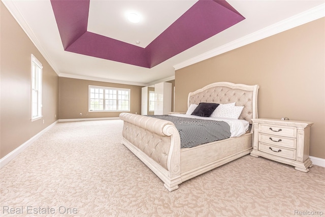 15390 Prestwick Cir, Northville, MI 48168 - bedroom featuring light colored carpet, baseboards, a tray ceiling, and ornamental molding