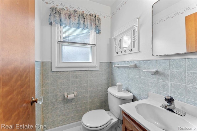 8424 Roosevelt St, Taylor, MI 48180 - half bath with toilet, vanity, a wainscoted wall, and tile walls