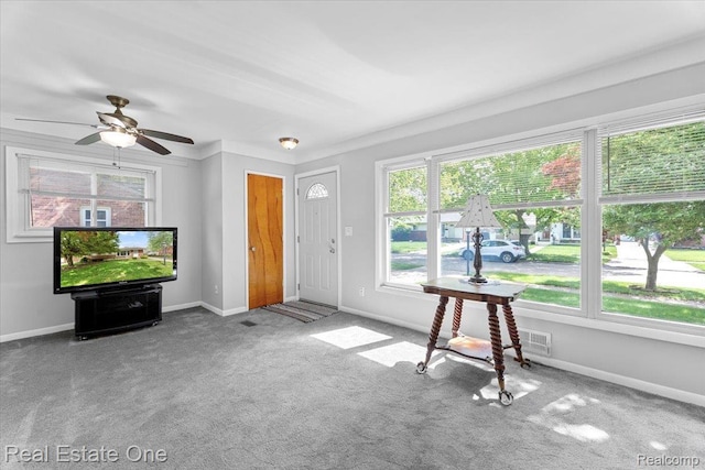 8424 Roosevelt St, Taylor, MI 48180 - carpeted foyer entrance featuring baseboards and a ceiling fan