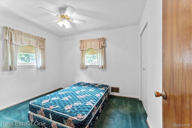 8424 Roosevelt St, Taylor, MI 48180 - bedroom featuring carpet floors, baseboards, and ceiling fan