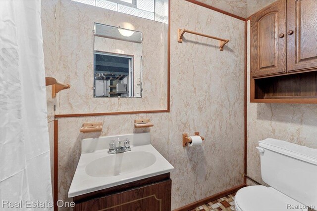 8424 Roosevelt St, Taylor, MI 48180 - bathroom featuring vanity and toilet