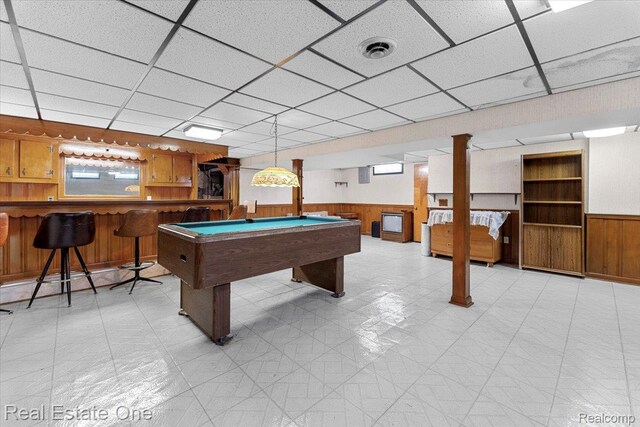 8424 Roosevelt St, Taylor, MI 48180 - recreation room with wainscoting, bar area, wood walls, billiards table, and a paneled ceiling