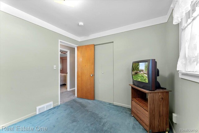 8424 Roosevelt St, Taylor, MI 48180 - unfurnished bedroom with carpet floors and baseboards