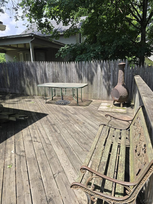 124 N Madison St, Adrian, MI 49221 - wooden deck featuring outdoor dining space