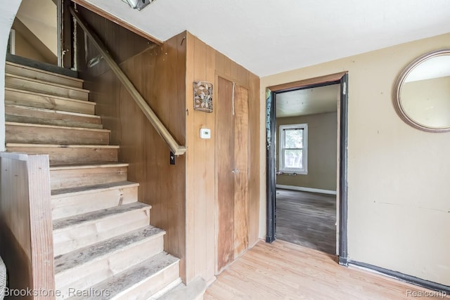 725 E Sherman St, Holly, MI 48442 - stairway with wood finished floors and baseboards