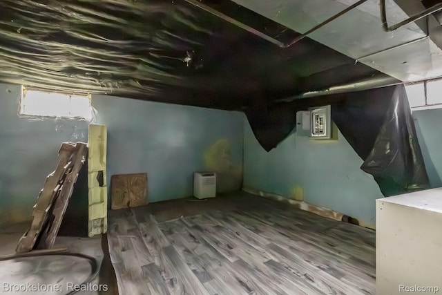 725 E Sherman St, Holly, MI 48442 - basement with wood finished floors