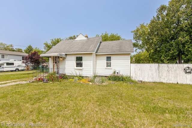 725 E Sherman St, Holly, MI 48442 - view of property exterior with roof with shingles