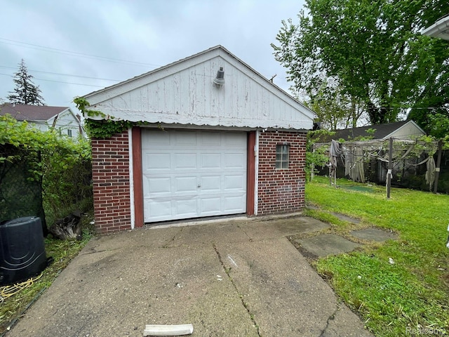 13960 Mettetal St, Detroit, MI 48227 - detached garage with concrete driveway