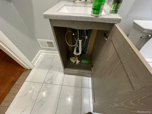 13960 Mettetal St, Detroit, MI 48227 - bathroom view of baseboards and toilet
