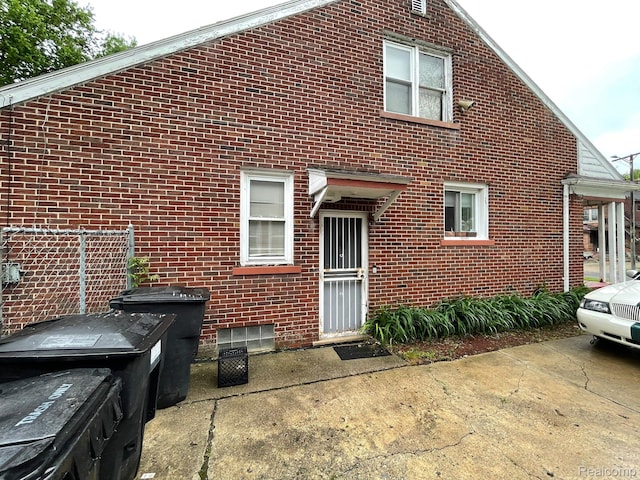13960 Mettetal St, Detroit, MI 48227 - back of house with brick siding