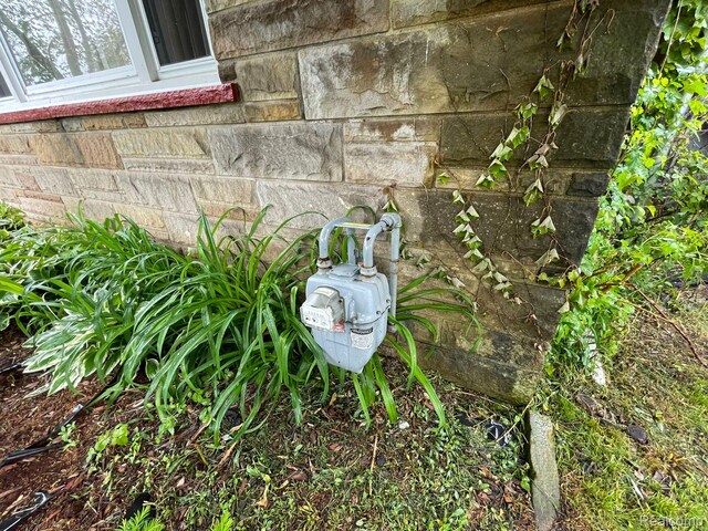 13960 Mettetal St, Detroit, MI 48227 - exterior view of gas meter and stone siding