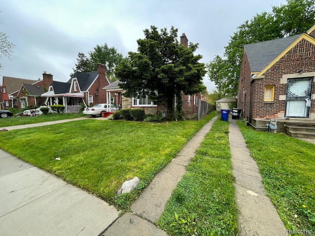 13960 Mettetal St, Detroit, MI 48227 - view of green lawn