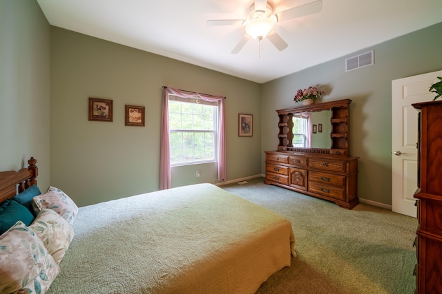 5610 Copper Sands Run, Fruitport, MI 49415 - bedroom with carpet, a ceiling fan, and baseboards