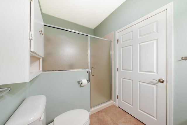 5610 Copper Sands Run, Fruitport, MI 49415 - full bathroom featuring toilet, a stall shower, and tile patterned flooring