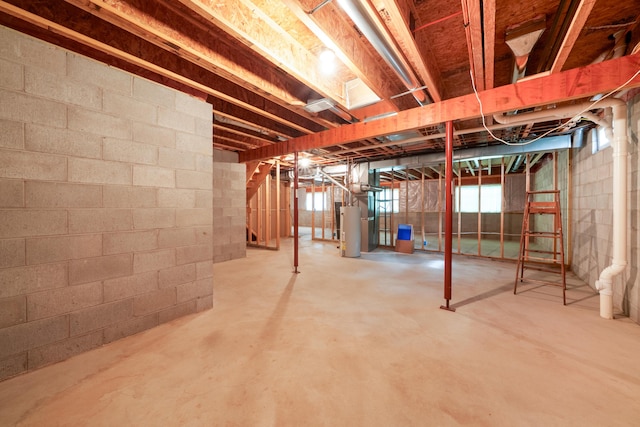 5610 Copper Sands Run, Fruitport, MI 49415 - unfinished below grade area with water heater and concrete block wall
