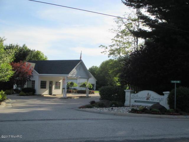 5610 Copper Sands Run, Fruitport, MI 49415 - view of front of house with asphalt driveway