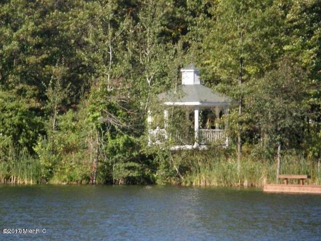5610 Copper Sands Run, Fruitport, MI 49415 - water view with a forest