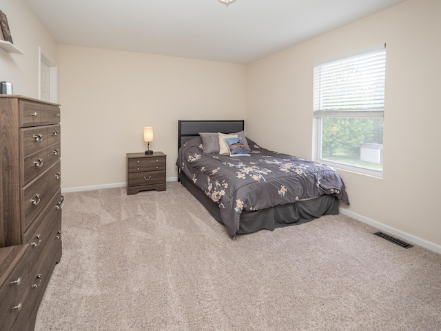 3247 Edling Dr, Kalamazoo, MI 49004 - carpeted bedroom with baseboards