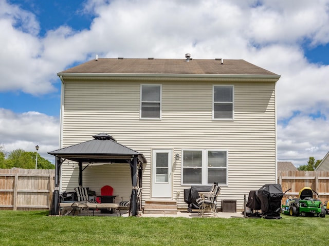 3247 Edling Dr, Kalamazoo, MI 49004 - rear view of house with entry steps, a gazebo, a patio, and central AC