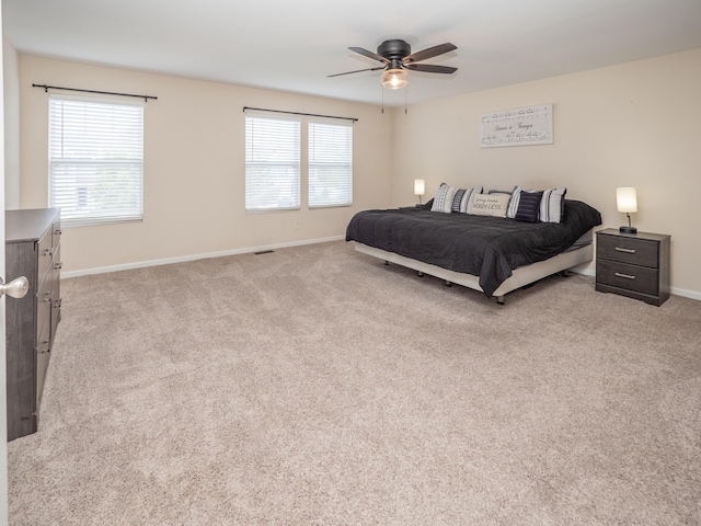 3247 Edling Dr, Kalamazoo, MI 49004 - carpeted bedroom featuring baseboards and ceiling fan