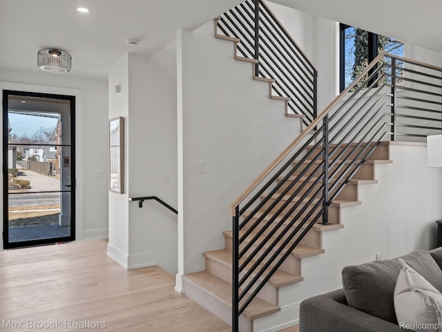 667 Oak Ave, Birmingham, MI 48009 - staircase with plenty of natural light, wood finished floors, baseboards, and recessed lighting