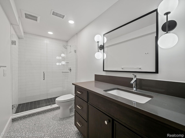 667 Oak Ave, Birmingham, MI 48009 - full bathroom featuring vanity, toilet, a shower stall, and recessed lighting