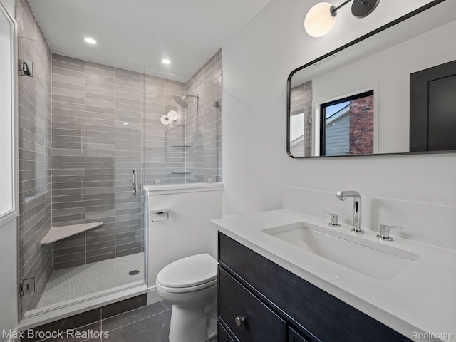 667 Oak Ave, Birmingham, MI 48009 - bathroom with tile patterned floors, vanity, toilet, a shower stall, and recessed lighting