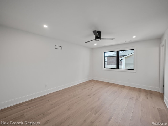 667 Oak Ave, Birmingham, MI 48009 - spare room with a ceiling fan, recessed lighting, light wood-style floors, and baseboards