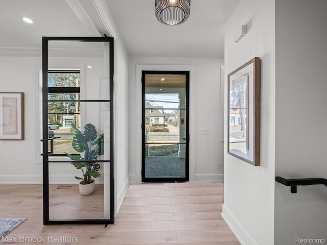 667 Oak Ave, Birmingham, MI 48009 - entryway featuring light wood finished floors and baseboards