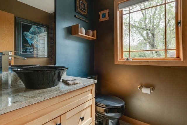7346 Dunross Dr, Portage, MI 49024 - half bath featuring toilet and vanity
