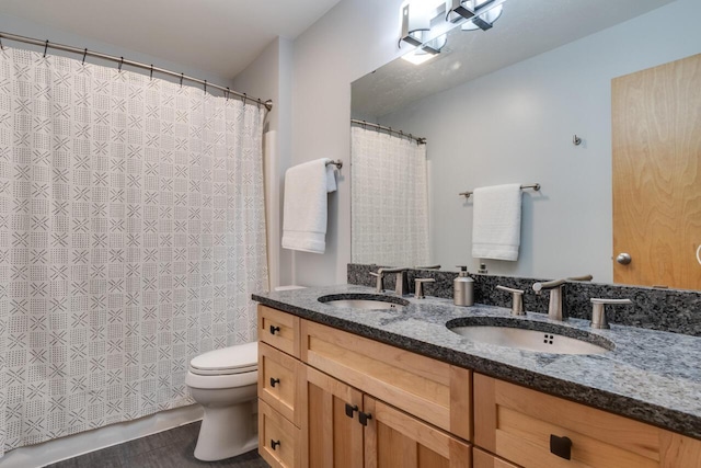 7346 Dunross Dr, Portage, MI 49024 - bathroom with toilet and double vanity