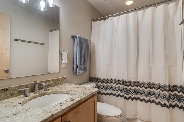 7346 Dunross Dr, Portage, MI 49024 - bathroom with toilet, vanity, recessed lighting, and a shower with curtain