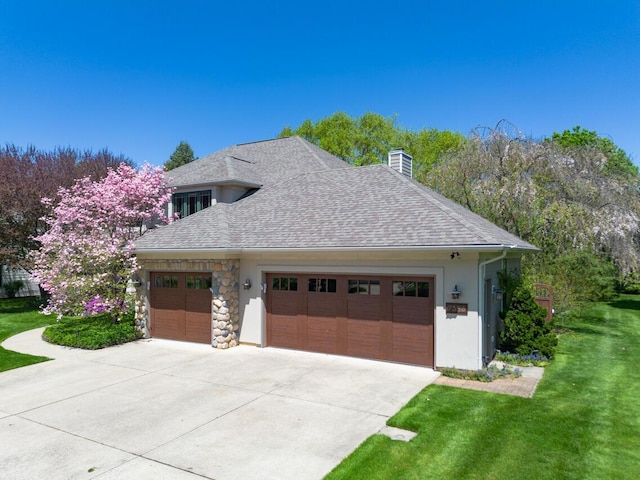 7346 Dunross Dr, Portage, MI 49024 - view of side of home with a yard, a chimney, an attached garage, driveway, and roof with shingles
