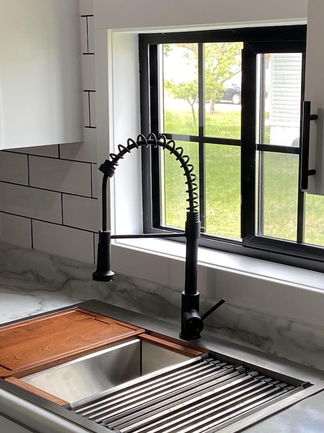 4050 Larkspur Ln, Muskegon, MI 49442 - exercise room with a sink