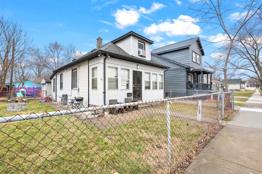 78 E Auburn St, Ecorse, MI 48229 - view of property exterior featuring a chimney and roof with shingles