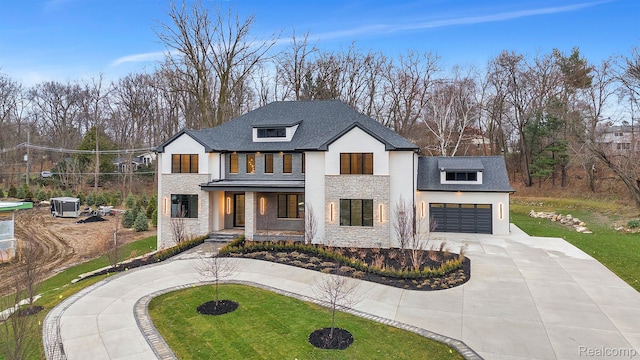 4627 Cimarron Dr, Bloomfield Hills, MI 48302 - view of front of house with stone siding, concrete driveway, covered porch, an attached garage, and a front yard
