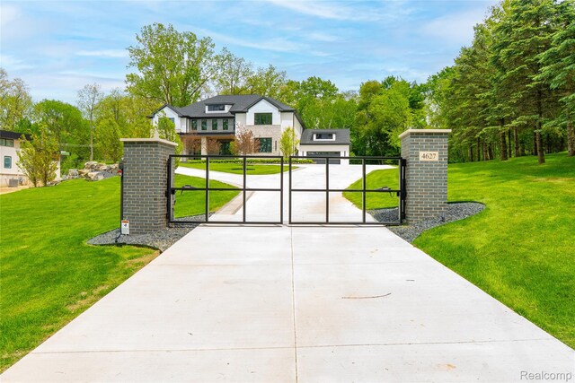 4627 Cimarron Dr, Bloomfield Hills, MI 48302 - gate with view of scattered trees