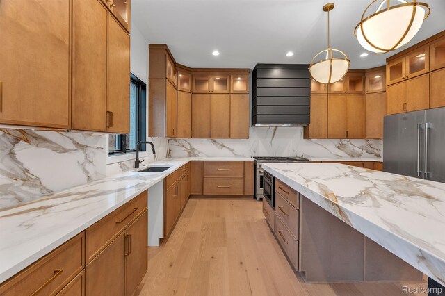4627 Cimarron Dr, Bloomfield Hills, MI 48302 - kitchen featuring a sink, wall chimney exhaust hood, high end appliances, light wood-style floors, and light stone countertops