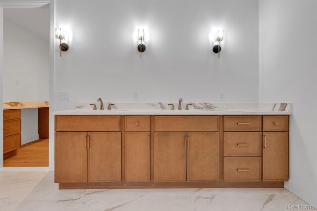 4627 Cimarron Dr, Bloomfield Hills, MI 48302 - bathroom featuring marble look tile flooring, vanity, and baseboards