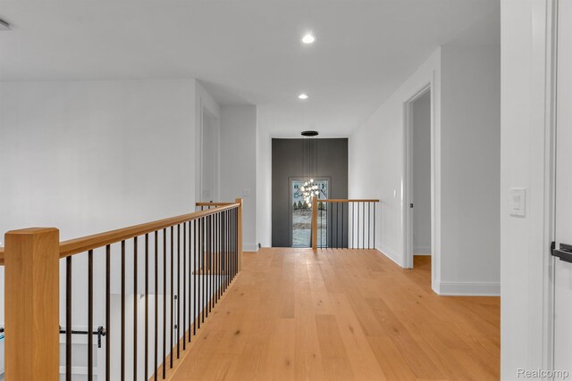 4627 Cimarron Dr, Bloomfield Hills, MI 48302 - corridor with wood finished floors, baseboards, recessed lighting, and an upstairs landing