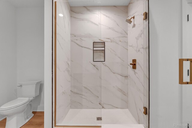 4627 Cimarron Dr, Bloomfield Hills, MI 48302 - bathroom with toilet, a marble finish shower, and wood finished floors