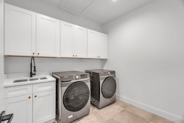 4627 Cimarron Dr, Bloomfield Hills, MI 48302 - laundry area with cabinet space, washer and clothes dryer, and baseboards