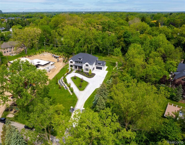 4627 Cimarron Dr, Bloomfield Hills, MI 48302 - drone / aerial view of a heavily wooded area