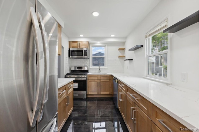 3625 Ellwood Ave, Birmingham, MI 48072 - kitchen featuring stainless steel appliances, plenty of natural light, backsplash, a sink, and recessed lighting