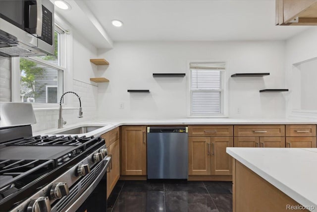 3625 Ellwood Ave, Birmingham, MI 48072 - kitchen with open shelves, stainless steel appliances, brown cabinetry, backsplash, and recessed lighting