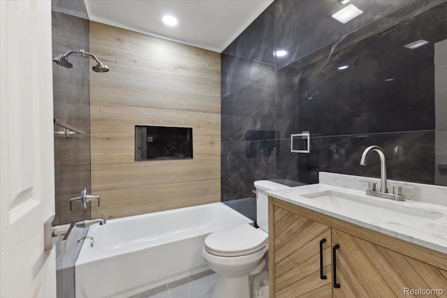 3625 Ellwood Ave, Birmingham, MI 48072 - full bathroom featuring tile walls, vanity, toilet, shower / bath combination, and tile patterned floors
