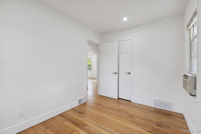 3625 Ellwood Ave, Birmingham, MI 48072 - unfurnished bedroom featuring light wood finished floors, baseboards, recessed lighting, and cooling unit